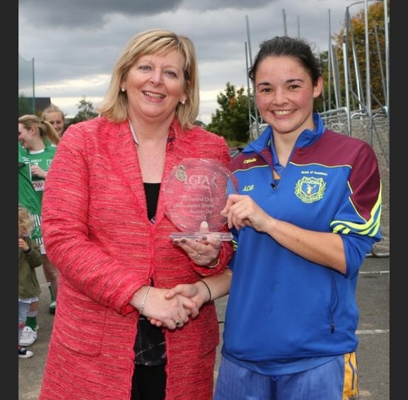 Captain Aoife DeBurca accepting the runners-up shield on behalf of her team