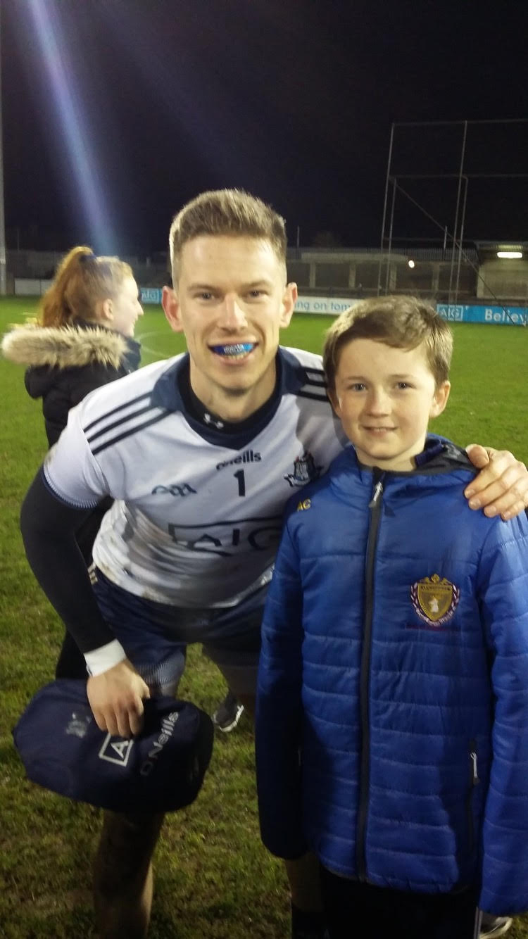 Andy Bunyan with juvenile player Alex Courtney after the game.